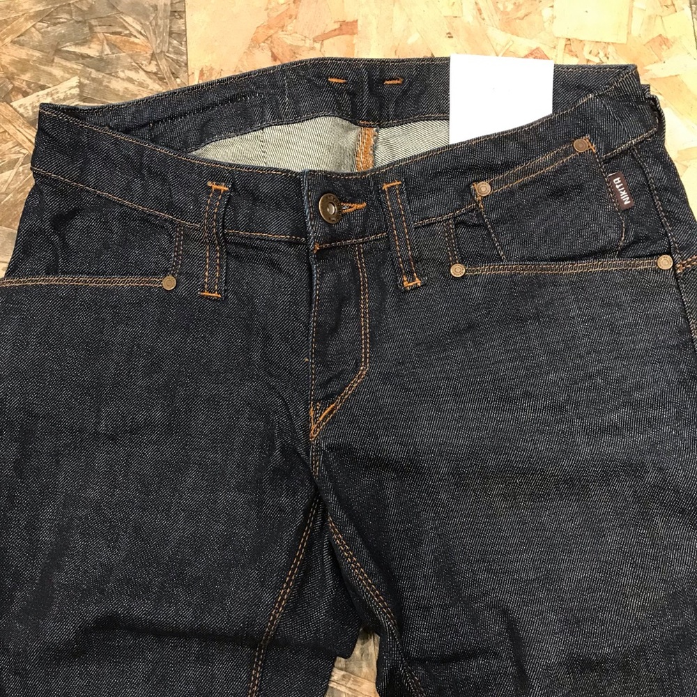 Vintage deadstock NWT Nikita dark denim jeans.